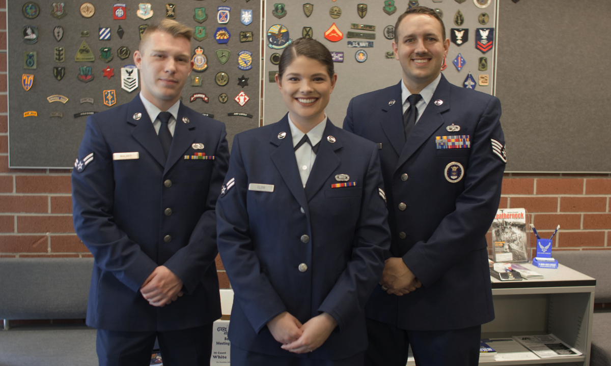 Three students in military uniforms