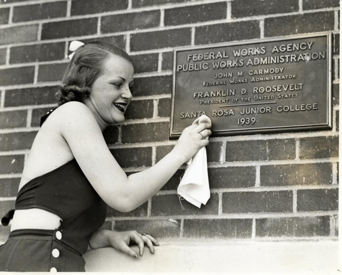 Student polishing plaque
