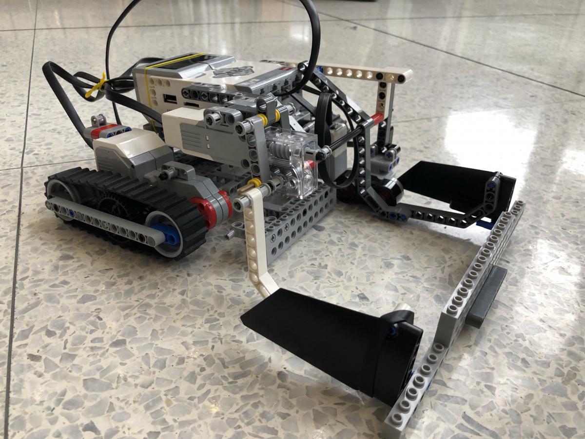 robot built with legos and other parts